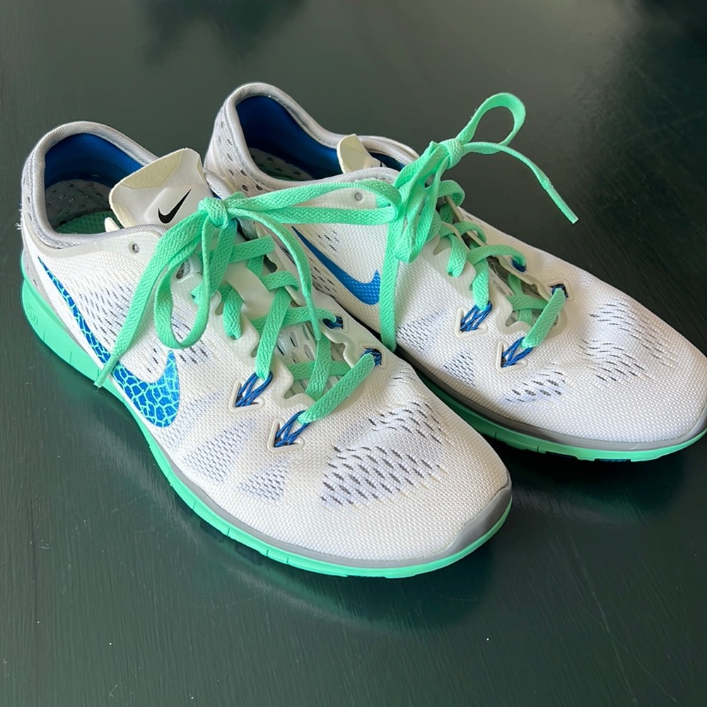 Nike free 5.0 shoes. White and teal, almost new. Size 6.5.